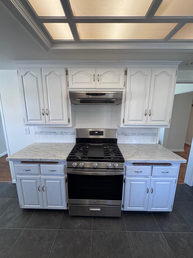 Stove and vent - 5845 Sunfield Ave