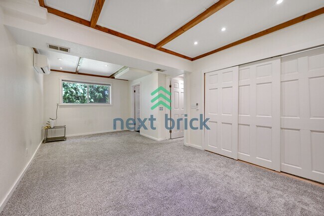Building Photo - Discover Spacious Comfort for multi-generational living: 4-Bedroom Home with additional kitchenet...