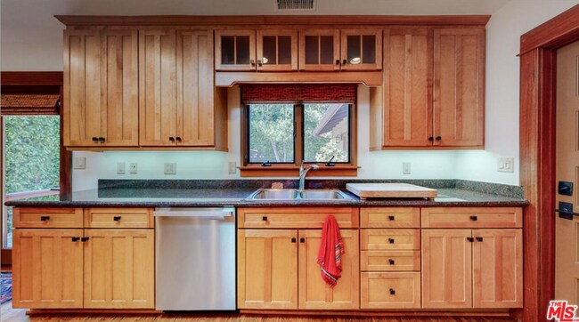 Building Photo - Impeccably restored Craftsman Securely Gated and Hedged for Privacy!