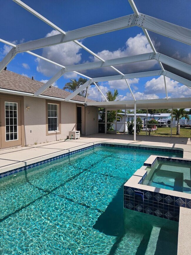 Building Photo - Port Charlotte Waterfront salt water pool annual rental