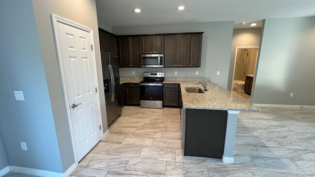 Building Photo - Beautiful 3 Bedroom Palm Bay Home with Upgrades & No Water Bill!