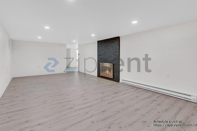 Building Photo - 242 NE 61st Ave