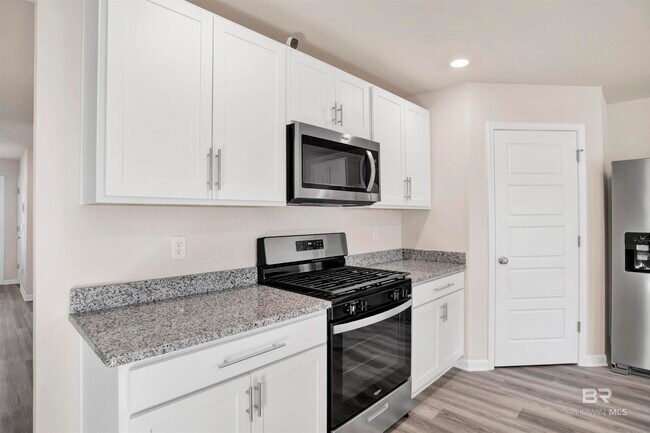 Building Photo - 32038 Lyon Rd