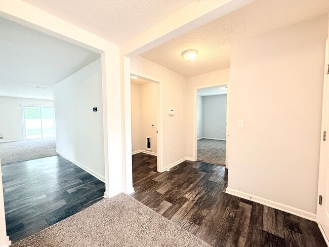 Building Photo - Spacious 4BR Home with Large Fenced Yard & Community Pool