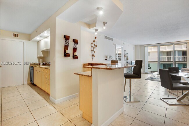 Building Photo - 6917 Collins Ave