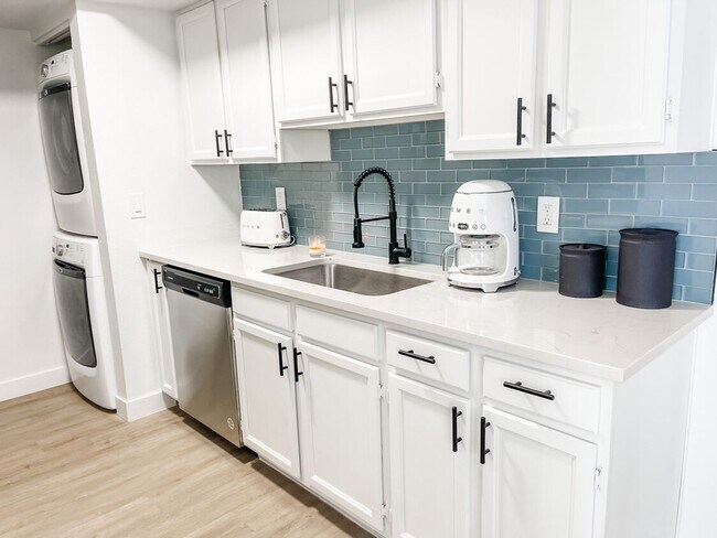 Building Photo - STUNNING TWO BEDROOMS CONDO WITH POOL CALL...