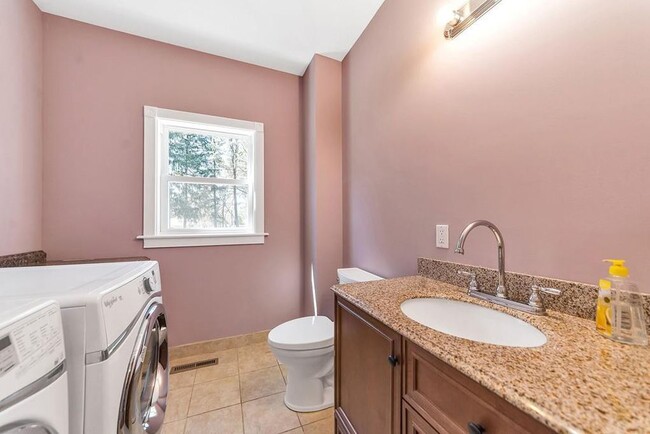 Half bath with laundry - 717 River Rd