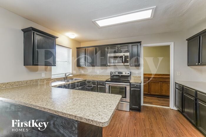 Building Photo - 5211 Timber Quail Dr