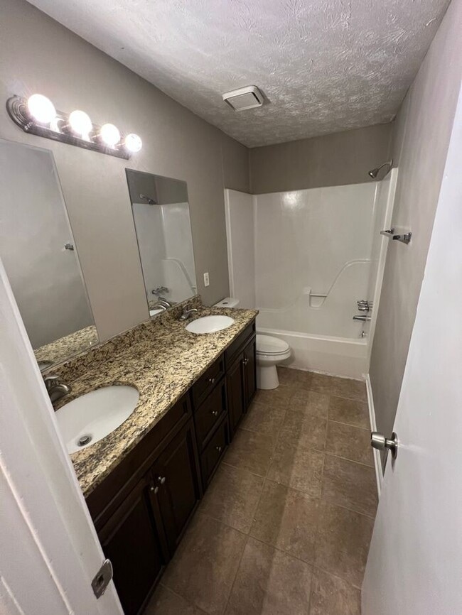 Building Photo - READY NOW!!! Corner Unit! 2 Bedroom 1.5 to...