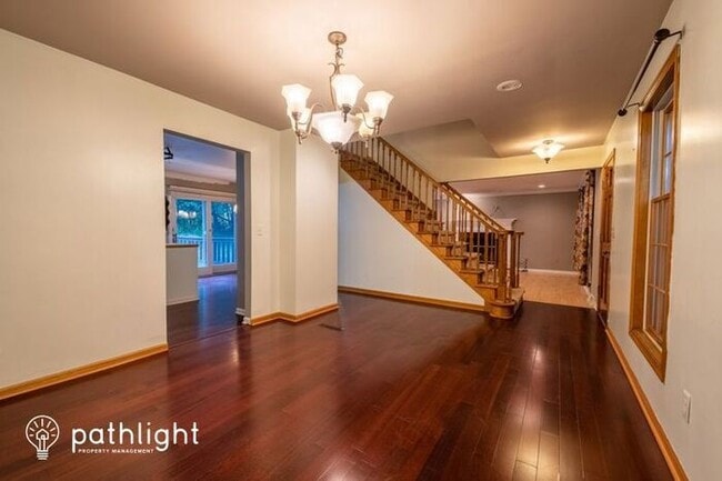 Building Photo - 5631 Whispering Pines Drive