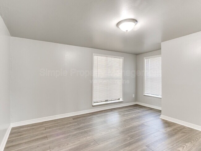 Building Photo - 9706 N Garnett Dr