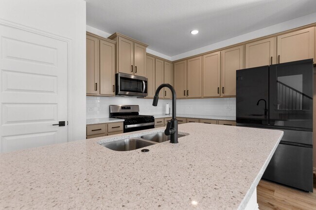 Building Photo - Spacious New-Build in Vibrant Community Mo...
