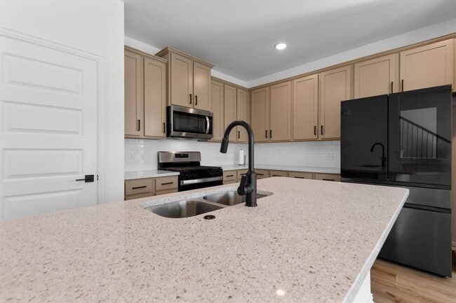 Building Photo - Spacious New-Build in Vibrant Community Move-In Ready!