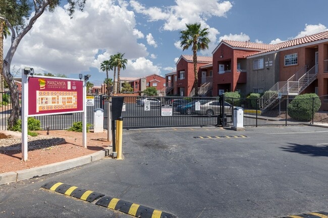 Building Photo - Two bedroom unit in gated NE community with pool