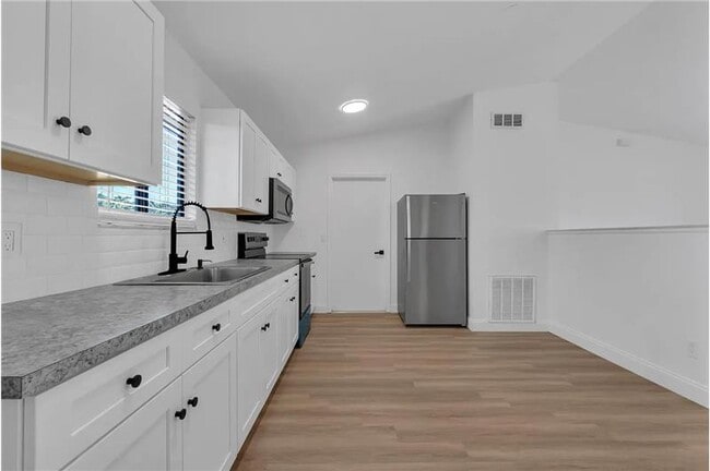 Building Photo - 322 Ixora Ave NW