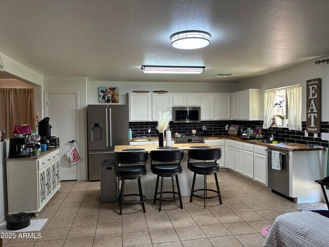 Building Photo - 7287 S Sunrise Way