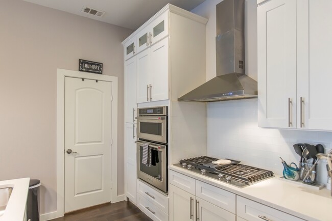 Laundry room right off kitchen - 1211 Beaconsfield Ln