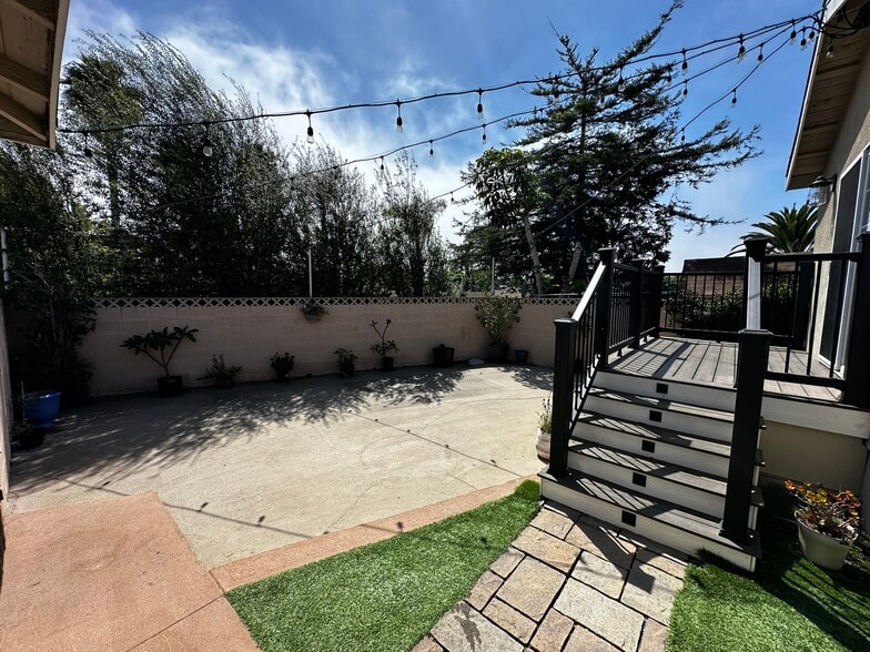 Backyard with String Lights - 819 W 27th St