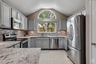 Building Photo - 7917 Woodland Dr