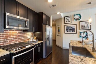 Building Photo - Lower Rates + 1 Month Free on a 2/2!