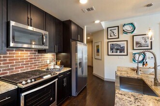 Building Photo - Lower Rates + 1 Month Free on a 2/2!