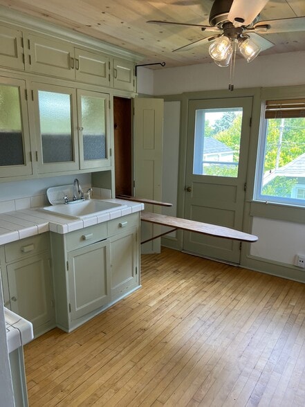 Kitchen With Built-In Ironing Board - 6326 W Grant St