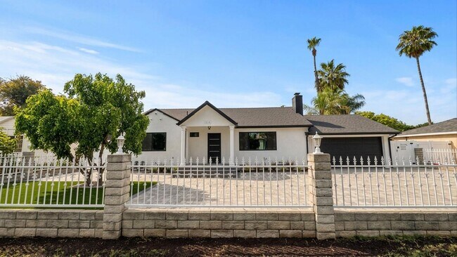 Building Photo - 7317-7321 Garden Grove Avenue