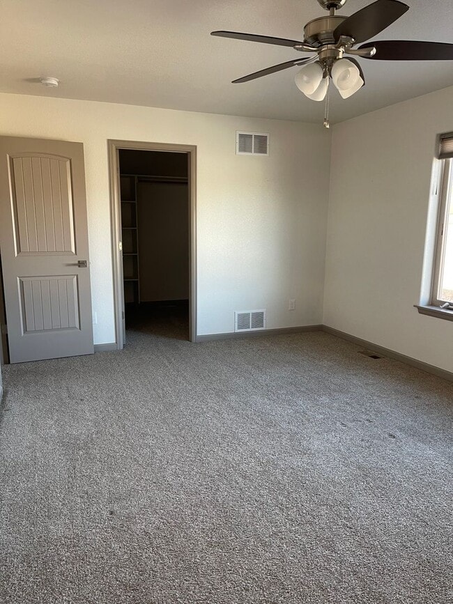 Building Photo - 3 Bedroom 2 Bath With a 2 car garage
