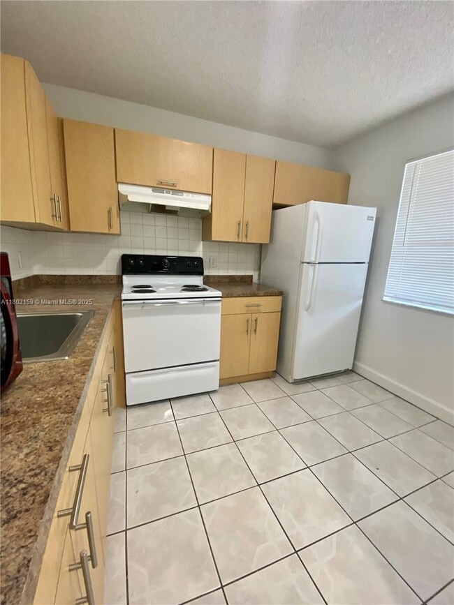 Building Photo - 8740 N Sherman Cir