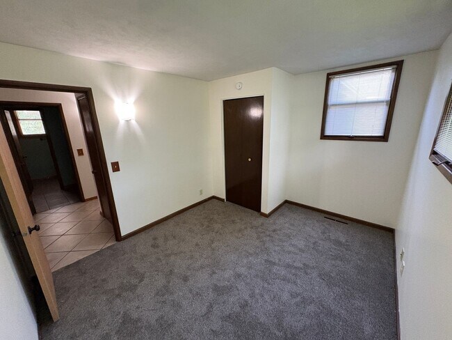 Building Photo - Spacious Home with Attached Garage & Fenced Backyard