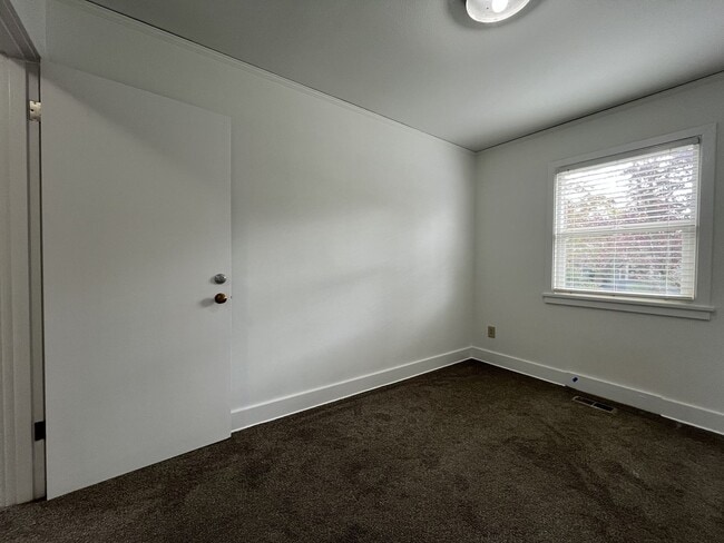 Building Photo - Expansive 4BR 2,900+ Sq Ft Home with Theater-Style Living Room & Bonus Hobby Workshop