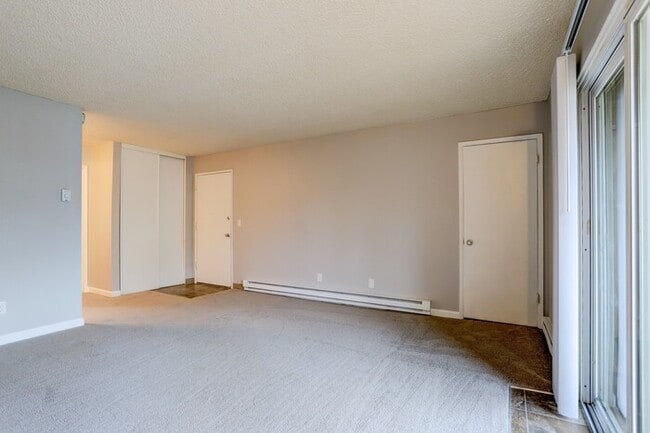 Building Photo - NOW LEASING : Spacious 2BR Upper Unit
