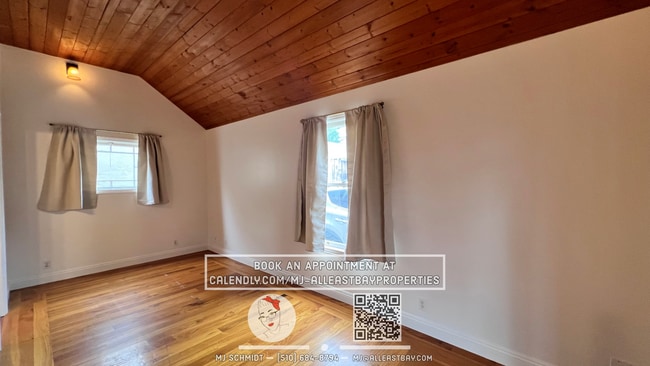 Building Photo - Quaint cottage with hardwood floors, private entrance and patio, surrounded by lush gardens!