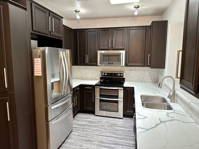 Building Photo - Gorgeous remodel update! No neighbors behind hillside lot