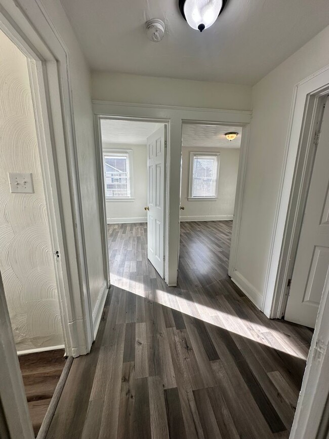 Building Photo - Three Bedroom Available Soon!