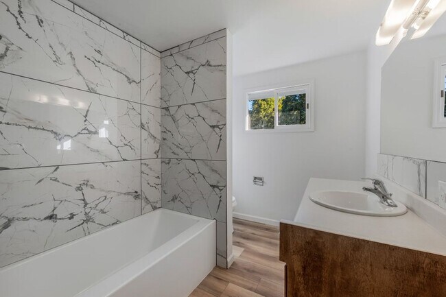 Building Photo - New Remodel 3 bed 1 bath (partial finished basement)