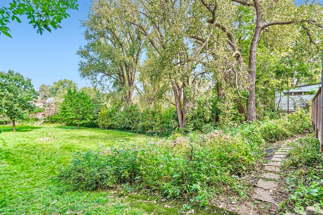 Building Photo - Lovely 4BR Home on a Quiet, Tree-Lined Street