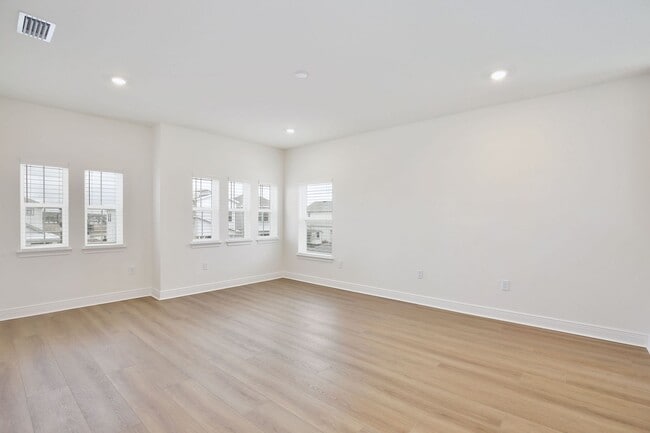 Building Photo - Gorgeous 4/3 Residence with a Private Back Lanai and a 2 Car Garage in the Delightful Laureate Pa...