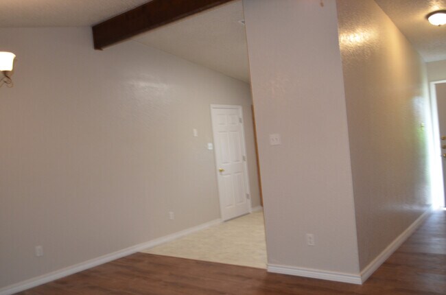 Building Photo - This 3 Bedroom Home with Fireplace is a must see!