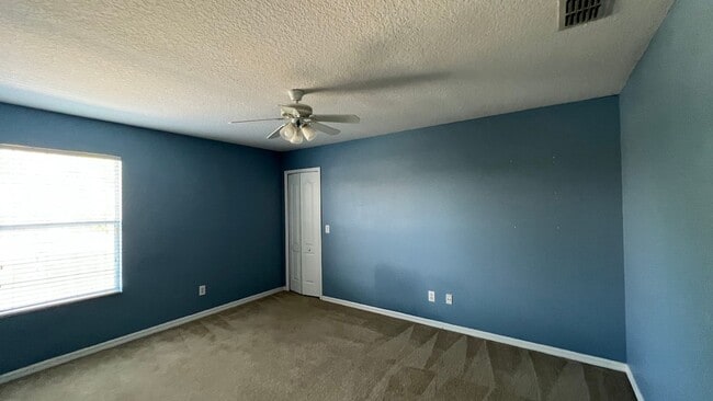 Building Photo - Spacious 4/3.5 Pool Home with Water View & 3-Car Garage in Lee Vista Area (close to Lake Nona)