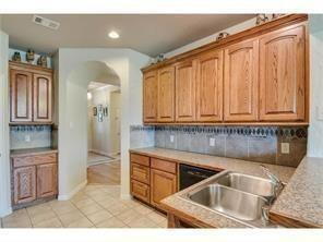 Building Photo - Former model home on corner lot is ready for move in!