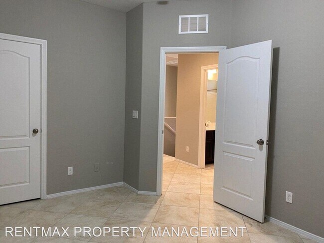 Building Photo - 4 br, 2.5 bath House - 688 CALAMUS PALMS PL