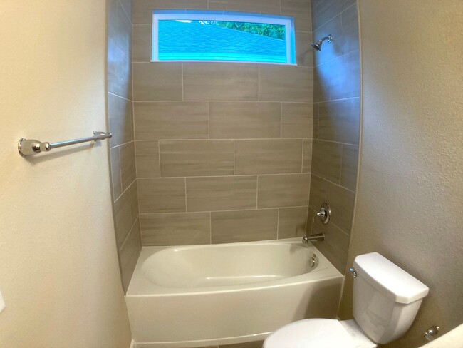 Building Photo - Your Private Escape with High-End Finishes...