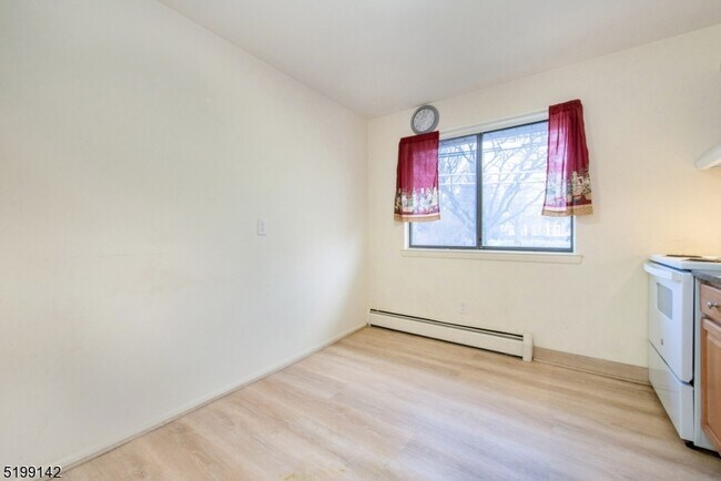 Building Photo - 685 Van Houten Ave