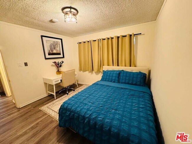 Building Photo - 14903 Normandie Ave