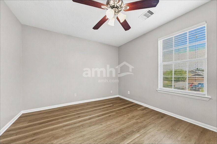Building Photo - 10719 Woodwind Shadows Dr