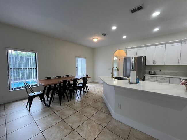 Building Photo - Beautiful Mediterranean Pool Home Availabl...