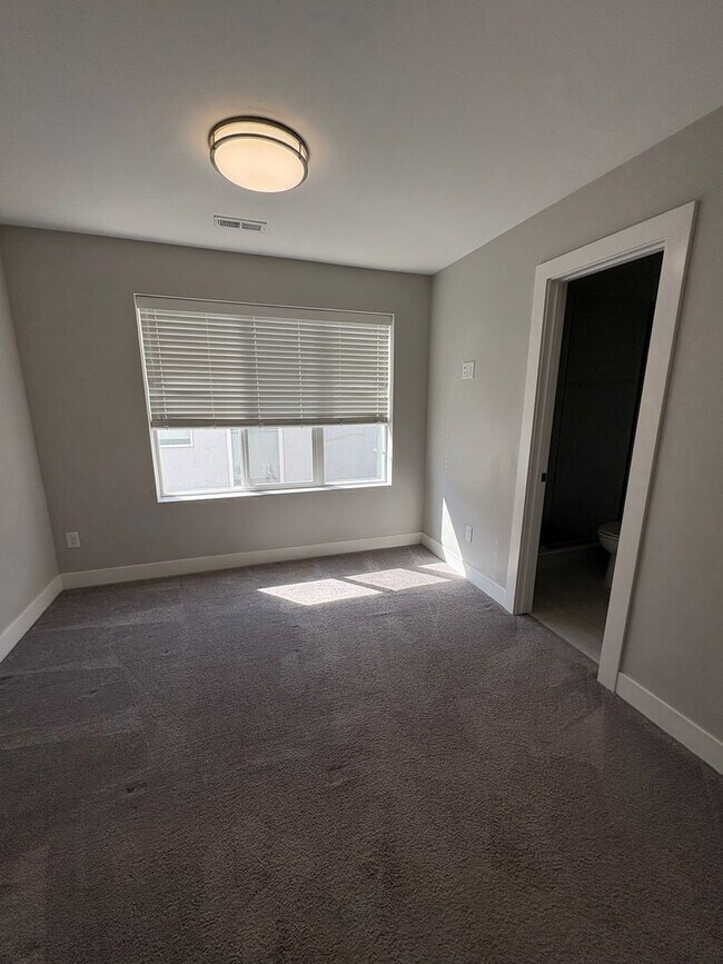 Building Photo - Modern 2 Bed + Flex Townhome with Rooftop Deck Near Paco Sanchez Park & Light Rail