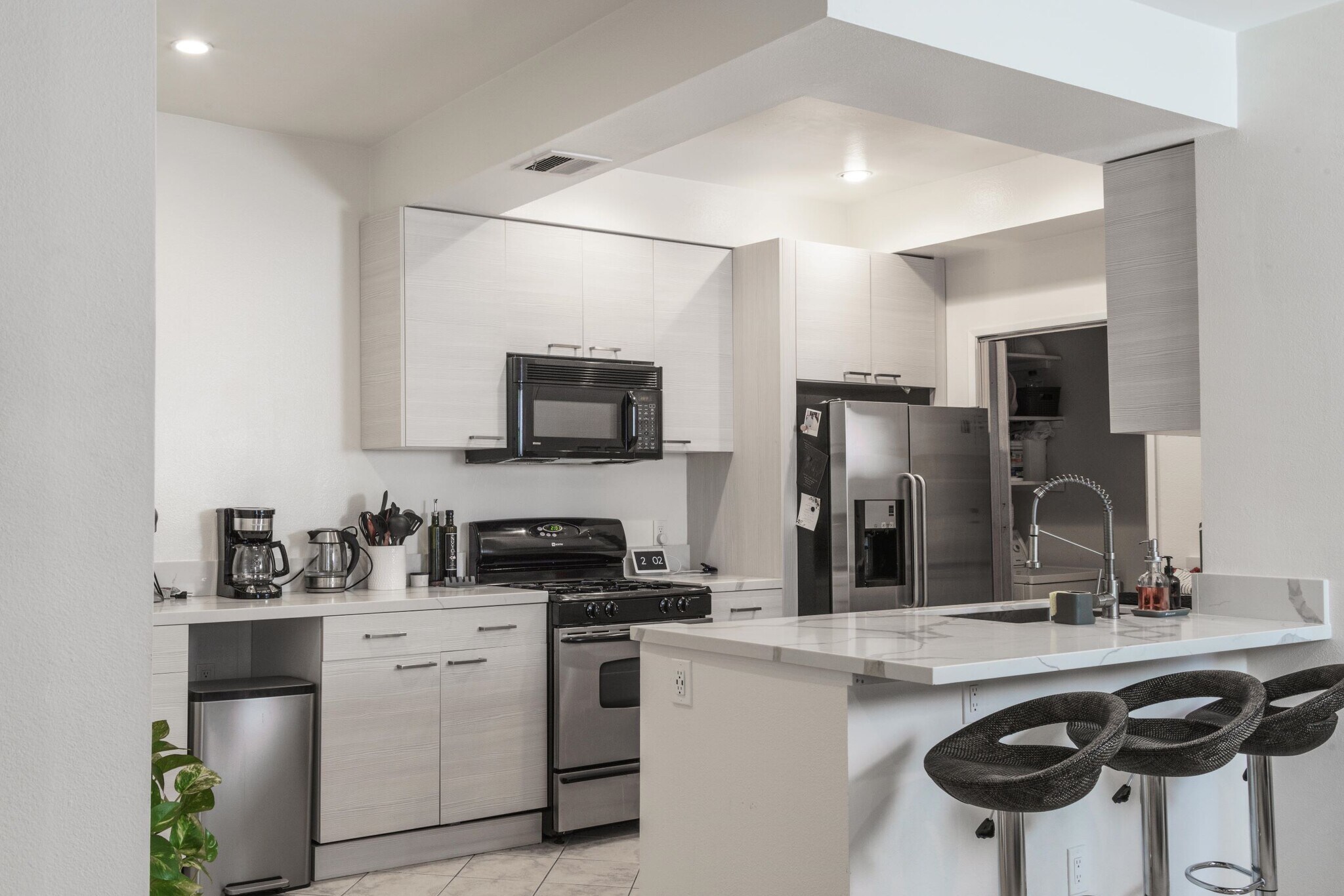 New top, cabinet and fridge (old shown) - 10021 Tabor Street