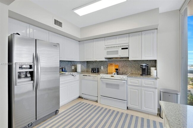 Building Photo - 6301 Collins Ave